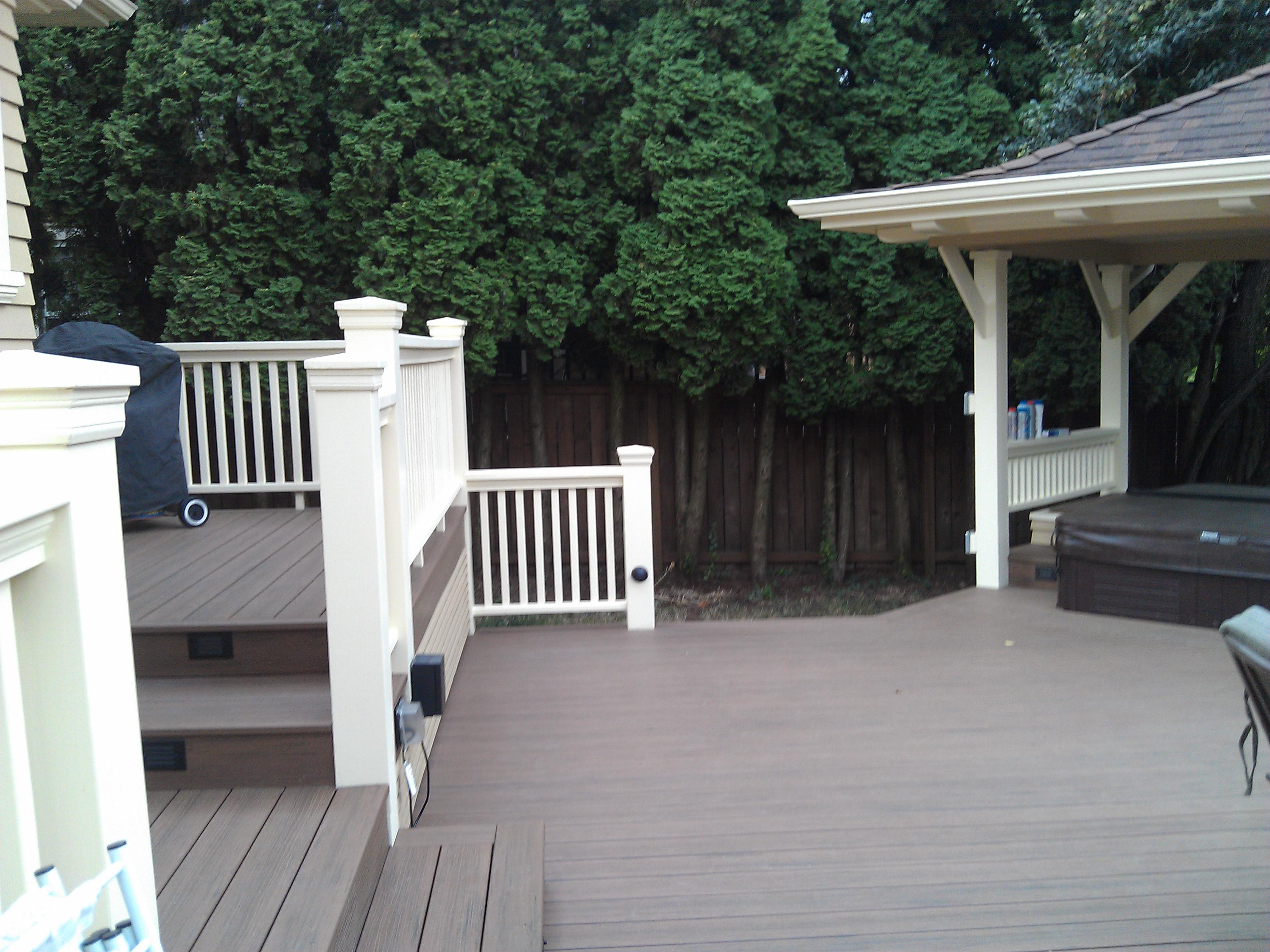Composite deck and custom wood rails